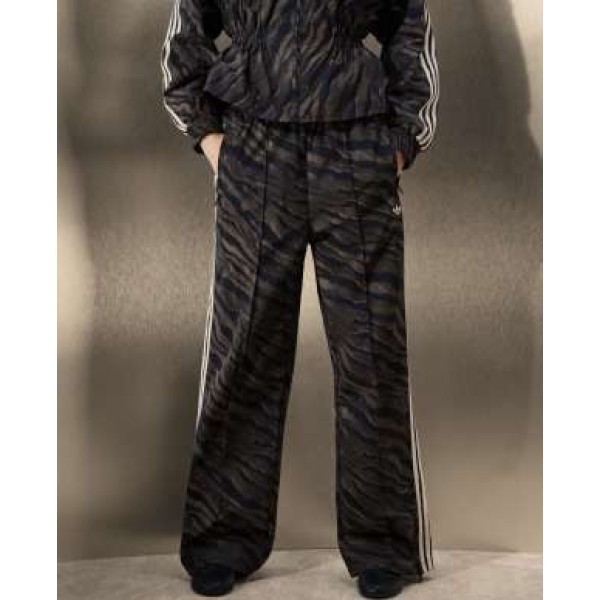 adidas Originals x ASOS track pants in brown zebra print