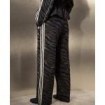 adidas Originals x ASOS track pants in brown zebra print