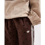 adidas Originals Firebird polka dot track pants in brown