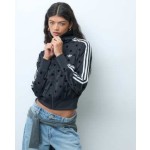 adidas Originals Firebird polka dot track top in black