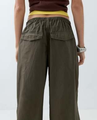 ASOS DESIGN parachute pants with toggle hem detail in khaki